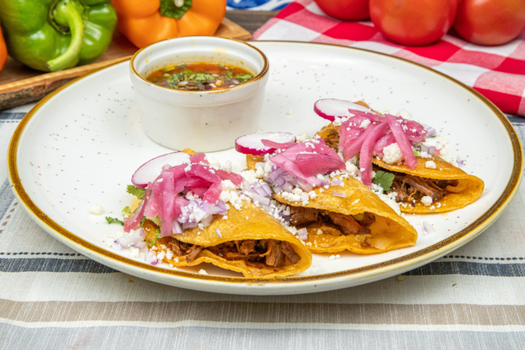 Quesabirria tacos with dipping consommé